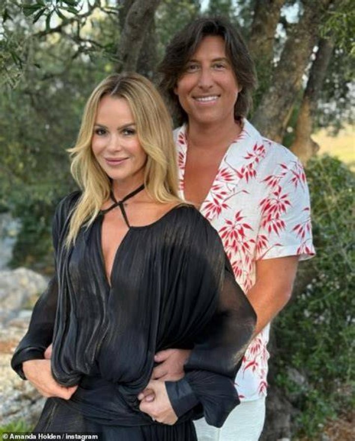 How old is Amanda Holdens husband Chris Hughes?