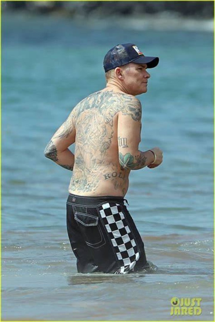 Tim Minch: Wife, net worth, tattoos, smoking & body facts